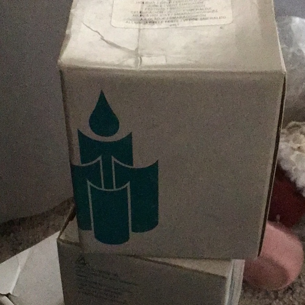 Holiday Cheer candles in emerald green and red  in original box.